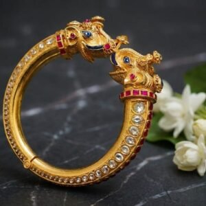 "Makara" or twin-elephant head design Kada