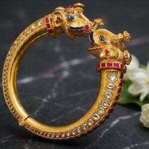 "Makara" or twin-elephant head design Kada